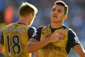 Alexis provides the meat in a hat trick sandwich; Theo and Olivier supply the bread.